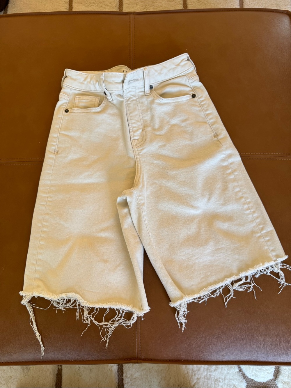 High-Rise Cream Denim Bermuda Shorts with Frayed Hem